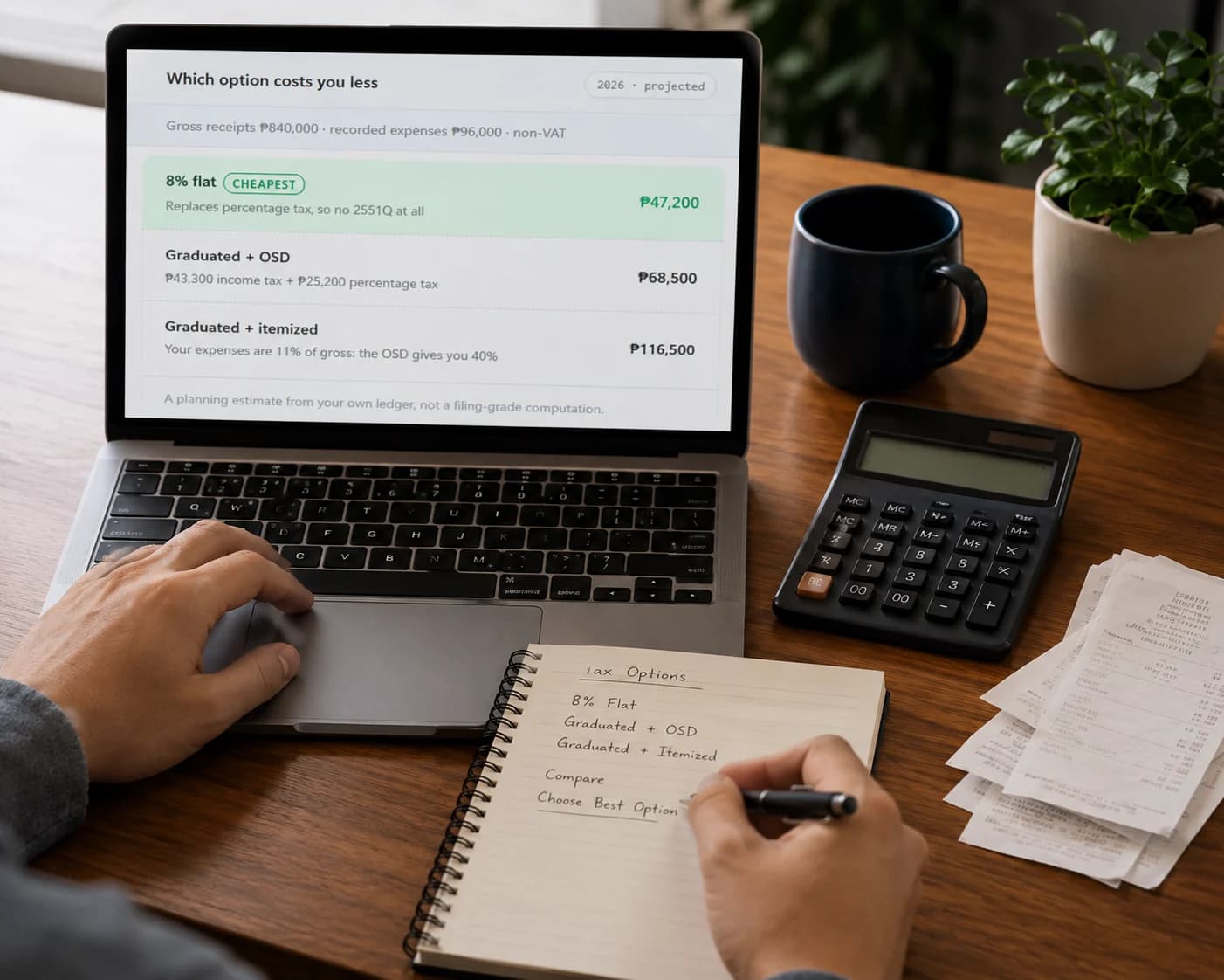 Comparing the 8% and graduated tax options on a laptop, with a calculator and receipts